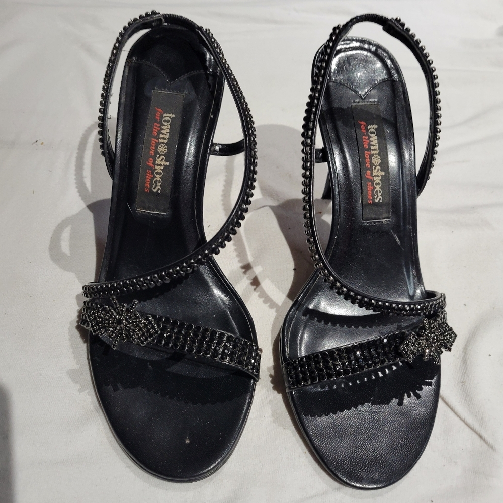 Black heel with Swarovski Crystals. Size 5